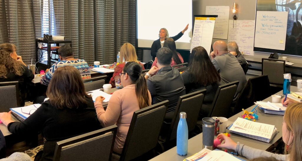 Photo of Katherine McLaughlin teaching a class.
